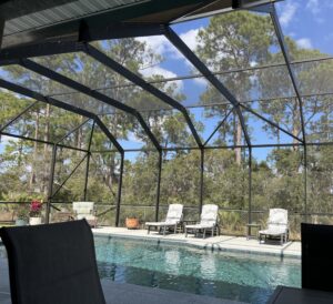 Sebring, Florida Pool house rental with screened in lanai and fenced year